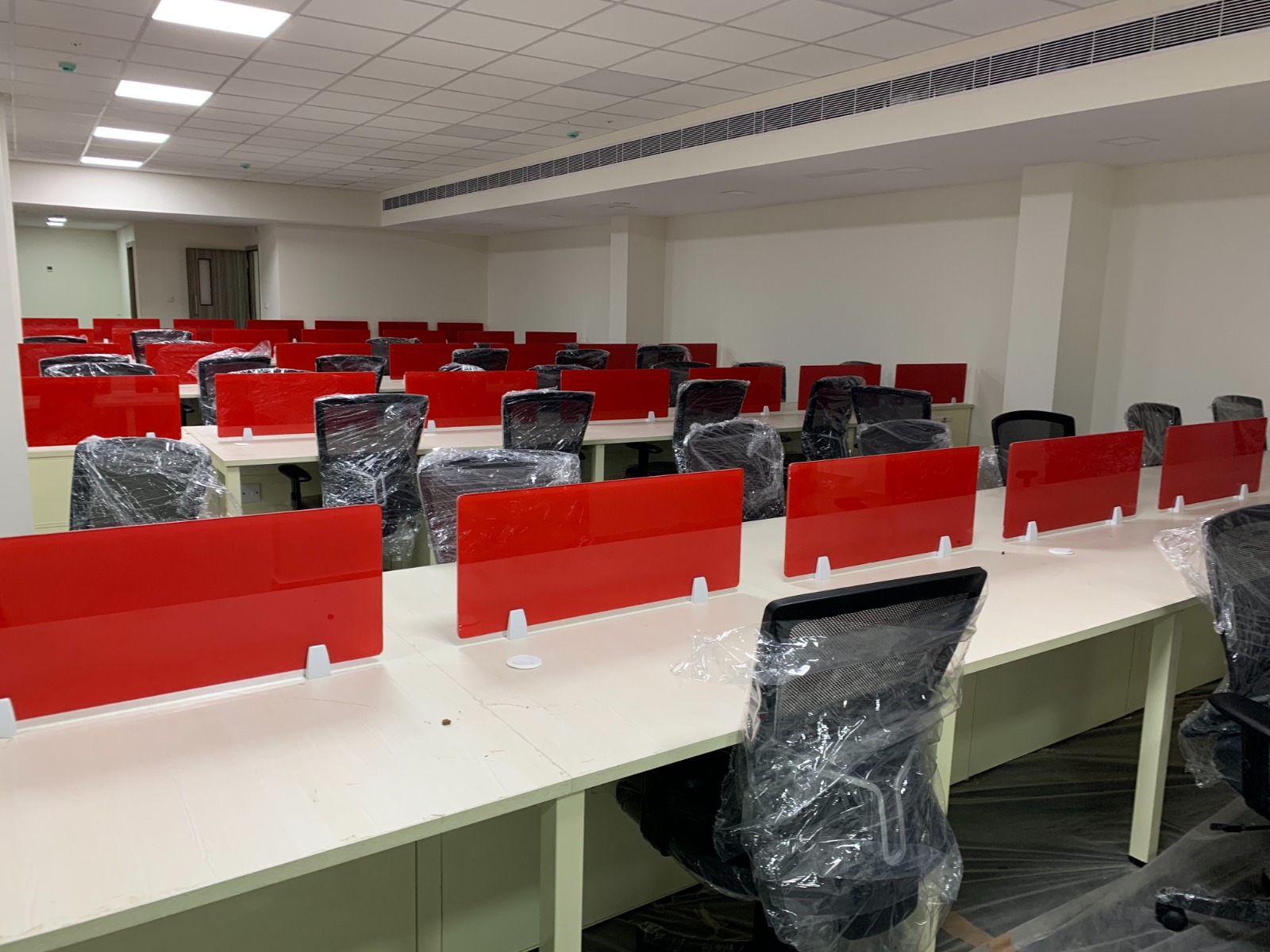 Nikkoh Coworks — dedicated desks area